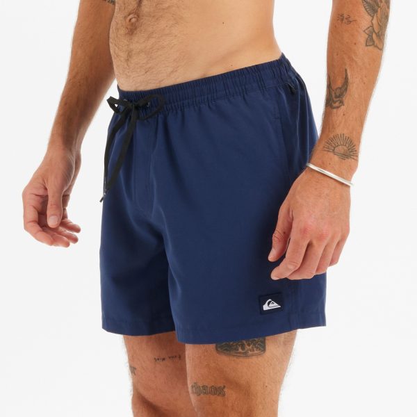 Navy Quiksilver men’s swimming shorts worn by a model